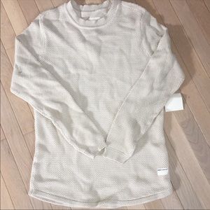 Tan extended length waffle knit crewneck sweater